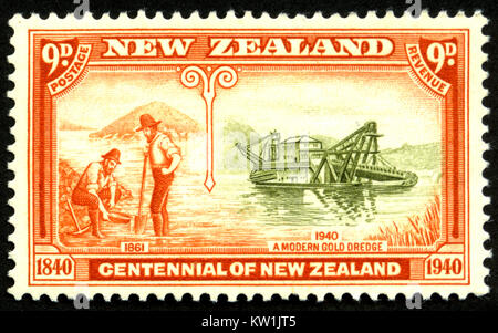 1940 nine pence stamp featuring gold dredging in Westland for New Zealand's Centennial Stock Photo
