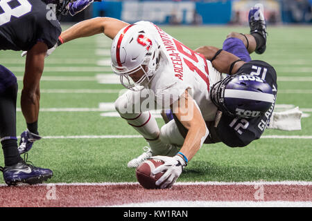 Morgantown, West Virginia, USA. 10th Nov, 2018. TCU Horned Frogs cornerback JEFF  GLADNEY (12) tries unsuccessfully to tackle West Virginia Mountaineers  running back KENNEDY MCKOY (6) during the Big 12 football game