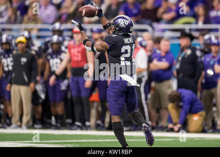 TCU running back Kyle Hicks (21) breaks away from Kansas safety Fish ...