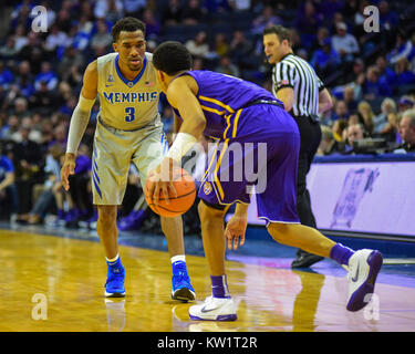 Memphis, USA. 28th Dec, 2017.  Memphis Tigers, JEREMIAH MARTIN (3), attempts to stop the drive of the LSU offense. LSU defeated the Memphis Tigers, 71-61, at the FedEx Forum. Credit: Cal Sport Media/Alamy Live News Stock Photo