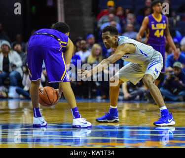 Memphis, USA. 28th Dec, 2017.  Memphis Tigers, JEREMIAH MARTIN (3), attempts to stop the drive of the LSU offense. LSU defeated the Memphis Tigers, 71-61, at the FedEx Forum. Credit: Cal Sport Media/Alamy Live News Stock Photo