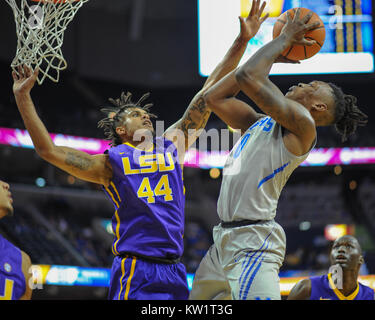 Memphis, USA. 28th Dec, 2017.  Memphis Tigers, KYVON DAVENPORT (0), drives to the basket as LSU, WAYDE SIMS (44), attempts to stop the drive. LSU defeated the Memphis Tigers, 71-61, at the FedEx Forum. Credit: Cal Sport Media/Alamy Live News Stock Photo