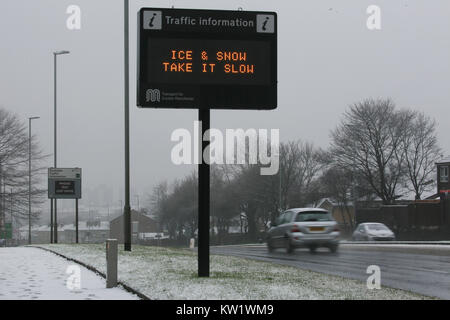 Saddleworth, UK. 29th Dec, 2017. A traffic sign at the side of a road reads 'Ice & Snow Take it slow', Rochdale, 29th December, 2017 (C)Barbara Cook/Alamy Live News Stock Photo