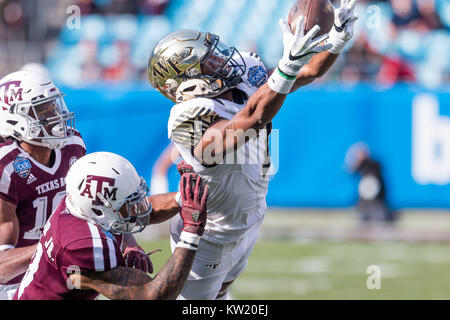 Charlotte, NC, USA. 29th Dec, 2017. Wake Forest wide receiver Scotty Washington (7) goes for the catch in the matchup between Texas A&M and Wake Forest at Bank of America Stadium in Charlotte, NC. (Scott Kinser/Cal Sport Media) Credit: csm/Alamy Live News Stock Photo