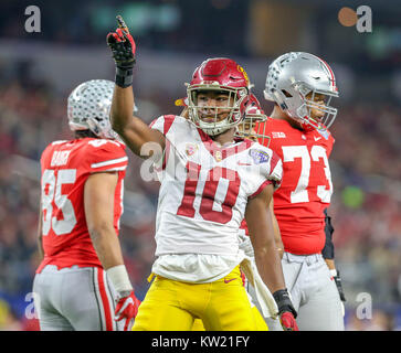 Arlington, TX, USA. 29th Dec, 2017. USC Trojans linebacker John Houston Jr. (10) celebrates after making a tackle in the first quarter during the Goodyear Cotton Bowl Classic between the USC Trojans and the Ohio State Buckeyes at AT&T Stadium in Arlington, TX. John Glaser/CSM/Alamy Live News Stock Photo