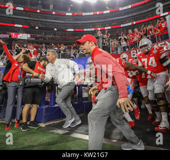 Arlington, TX, USA. 29th Dec, 2017. The Ohio State Buckeyes take the field at the start of the Goodyear Cotton Bowl Classic between the USC Trojans and the Ohio State Buckeyes at AT&T Stadium in Arlington, TX. John Glaser/CSM/Alamy Live News Stock Photo