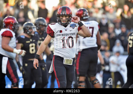 December 23, 2017 - San Diego State quarterback Christian Chapman walks towards the sideline during the second quarter of a NCAA college football game against Army in the Lockheed Martin Armed Forces Bowl at Amon G. Carter Stadium in Fort Worth, Texas. Army won 42-35. Austin McAfee/CSM Stock Photo