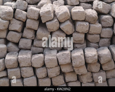 Graphic background from texture of bricks Handmade light beige color. Stock Photo