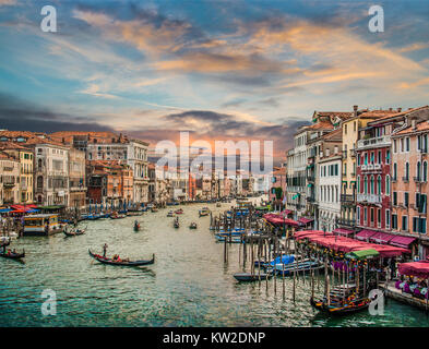 Panoramic view of famous Canal Grande from famous Rialto Bridge at sunset in Venice, Italy with retro vintage Instagram style filter effect Stock Photo
