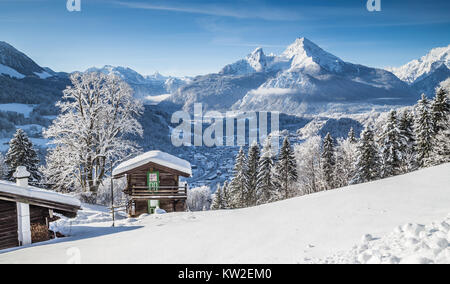 Beautiful mountain landscape in the Bavarian Alps with village of Berchtesgaden and Watzmann mountain top in the background at sunrise Stock Photo