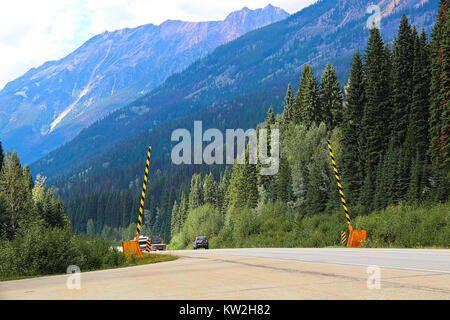 Road barriers on a mountainous road in summer. Stock Photo