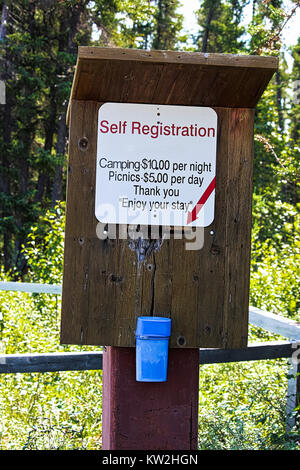 A self registration box with prices and money deposit. Stock Photo