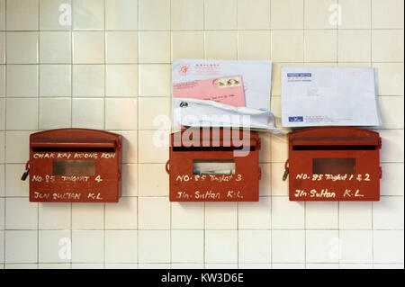 beautiful red mailboxes in an entrance on Jalan Sultan in Kuala Lumpur Stock Photo