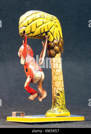 Bombo, tin toy monkey in tree, pic 7 Stock Photo