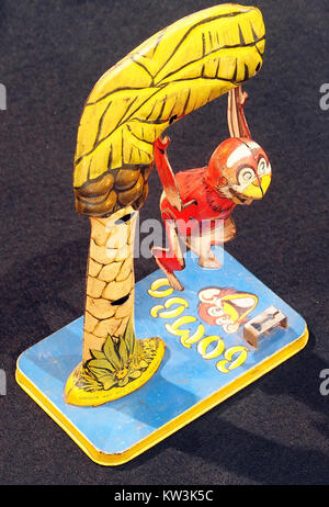 Bombo, tin toy monkey in tree, pic11 Stock Photo