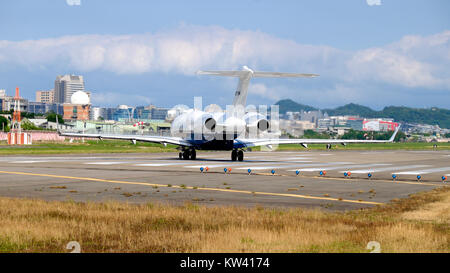 Bombardier BD 700 1A10 Global 5000 N717MK Departing from Taipei Songshan Airport 20151003e Stock Photo