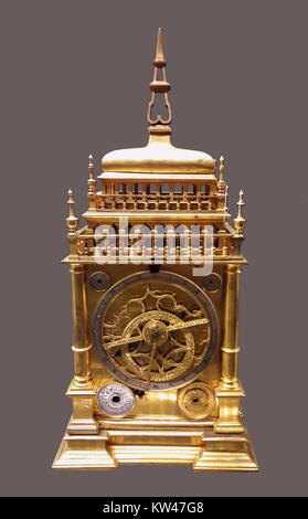 This Bommel astronomical table clock in tower form combines intricate timekeeping with celestial calculations, showcasing craftsmanship and functional design from the period of its creation. Stock Photo