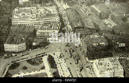 Market Street Manchester, England from the air in 1933 showing old trams and buses Stock Photo