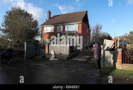 A view of damage to the gable end of a house in East Boldre, Hampshire, after strong winds hit on Friday. Stock Photo