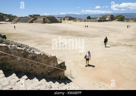 Monte Alban, Oaxaca, Mexico - MARCH 6, 2012: People explore Monte Alban, a large pre-Columbian archaeological site, Santa Cruz Xoxocotlan Municipality Stock Photo