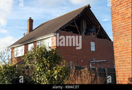 A view of damage to the gable end of a house in East Boldre, Hampshire, after strong winds hit on Friday. Stock Photo