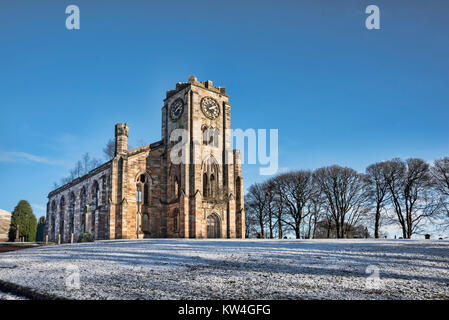 The shell of the derelict fire damaged Campsie High Church in Lennoxtown near Glasgow, Scotland on a snowy winters day. Stock Photo