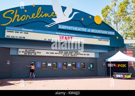 Ticket office at the Shoreline Amphitheatre, a popular concert venue in the Silicon Valley town of Mountain View, California, with marquee indicating upcoming concerts by acts including Heart, Def Leppard, REO Speedwagon, Neil Young, Metallica and Dave Matthews, Mountain View, California, August 24, 2016. Stock Photo