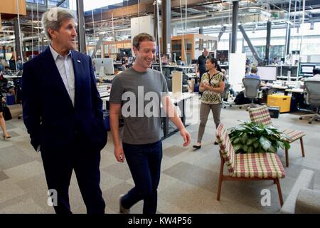 US Secretary of State John Kerry receiving a tour of Facebook headquarters from founder Mark Zuckerberg, Menlo Park, California, June 23, 2016. Image courtesy US Department of State. Stock Photo