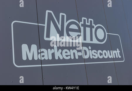 Netto discount store Sign. It is part of Edeka Group, largest German supermarket corporation employing 250,000 people. Stock Photo