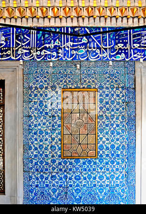 DECEMBER 30,2009 ISTANBUL TURKEY.Ancient Ottoman patterned tile composition with some verses in Arabic from Holy Quran Stock Photo