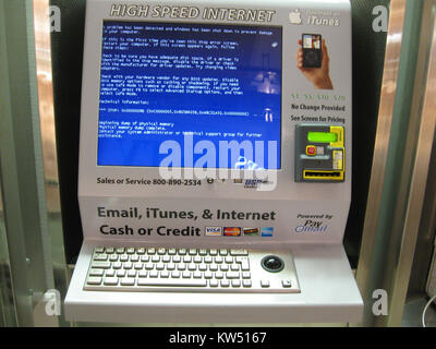 The Blue Screen of Death (BSoD) appears on an internet terminal when a critical system error occurs. It indicates a hardware or software failure, requiring troubleshooting. Stock Photo