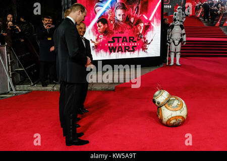 BB8 takes a bow before Prince William and Prince Harry attends the European Premiere of Star Wars - The Last Jedi at The Royal Albert Hall on Tuesday December 12, 2017. Pictured: Prince William, Duke of Cambridge ,Prince Henry of Wales. Stock Photo