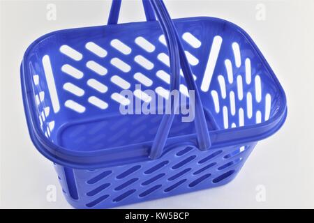An concept Image of a empty blue Shopping basket Stock Photo