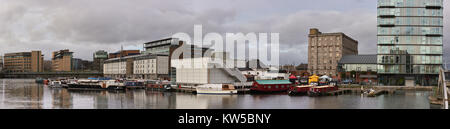 DUBLUN, IRELAND- February 1, 2017: Modern part of Dublin Docklands or Silicon Docks after heavy rain, panoramic image taken next to Grand Canal Stock Photo