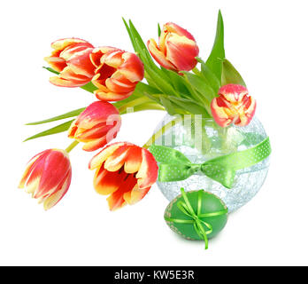 Easter still life with orange tulips and Easter eggs, isolated on white Stock Photo