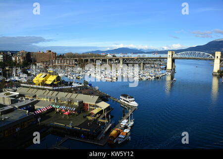 Vancouver BC skyline along with False Creek and Granville Island. Stock Photo