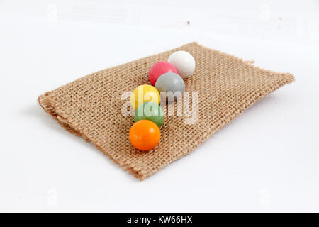 Bubble gum chewing gum balls texture. Rainbow multicolored gumballs chewing gums as background. Round sugar coated candy dragee bubblegum texture. Foo Stock Photo