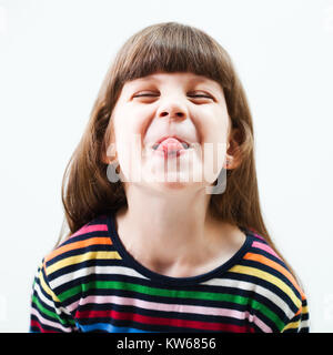 Little girl making face Stock Photo