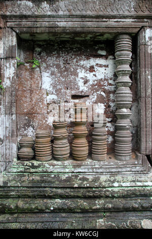 Stone window of temple in Wat Phu, Champasak, Laos Stock Photo