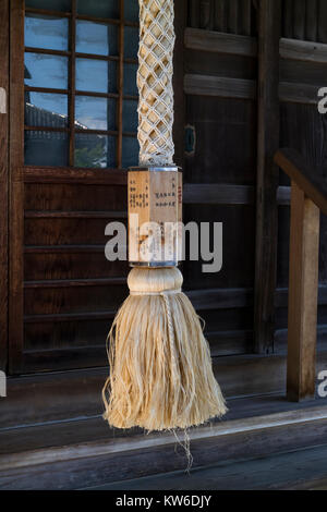 Kanazawa - Japan, June 11, 2017:  Names of the members of families who made donations to the temple on the rope of the temple bell Stock Photo
