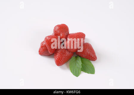 pile of compote strawberries on white background Stock Photo
