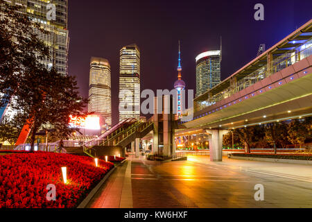 Century Avenue at Night - A night view of broad, bright, colorful and modern sidewalk of Century Avenue, a major street at Lujiazui, Shanghai, China. Stock Photo