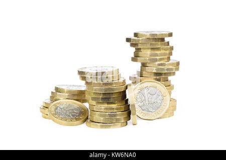 wobbly piles of uk sterling pound coins Stock Photo