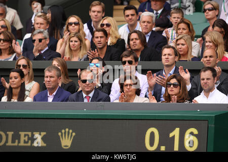 LONDON, ENGLAND - JULY 06: Novak Djokovic of Serbia defeats Roger Federer of Switzerland during the Gentlemen's Singles Final match on day thirteen of the Wimbledon Lawn Tennis Championships at the All England Lawn Tennis and Croquet Club on July 6, 2014 in London, England  People:  Unknown Stock Photo