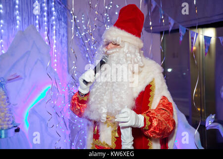 . Father Christmas , Jack Frost . Santa Claus singing Christmas songs . Father Frost singing Christmas songs Stock Photo