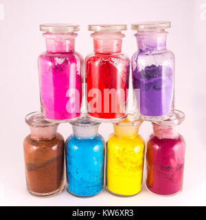 glass containers containing natural colored pigments in powder