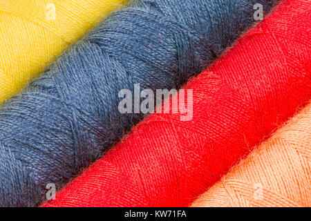 Abstract macro background of cotton yarn bobbins Stock Photo