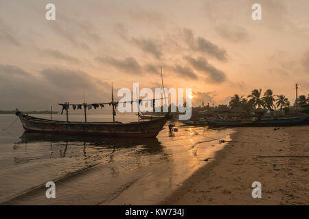 In the village of Ada Foah people live very close to the riverside, Volta River, Ada Foah, Greater Accra Region, Ghana, Africa Stock Photo