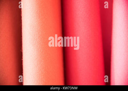 Multi color fabric texture samples as a background. Stock Photo