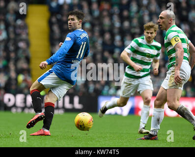 Rangers Josh Windass (left) and Celtic’s Scott Brown during the Scottish Premiership match at Celtic Park, Glasgow. PRESS ASSOCIATION Photo. Picture date: Saturday December 30, 2017. See PA story SOCCER Celtic. Photo credit should read: Ian Rutherford/PA Wire. RESTRICTIONS: EDITORIAL USE ONLY Stock Photo